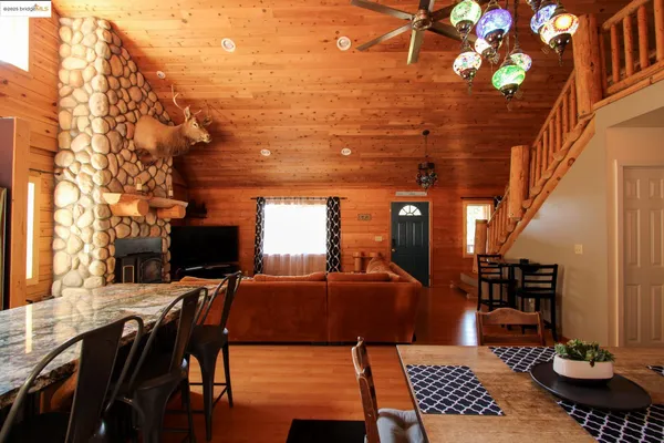 a kitchen with a sink stove and refrigerator