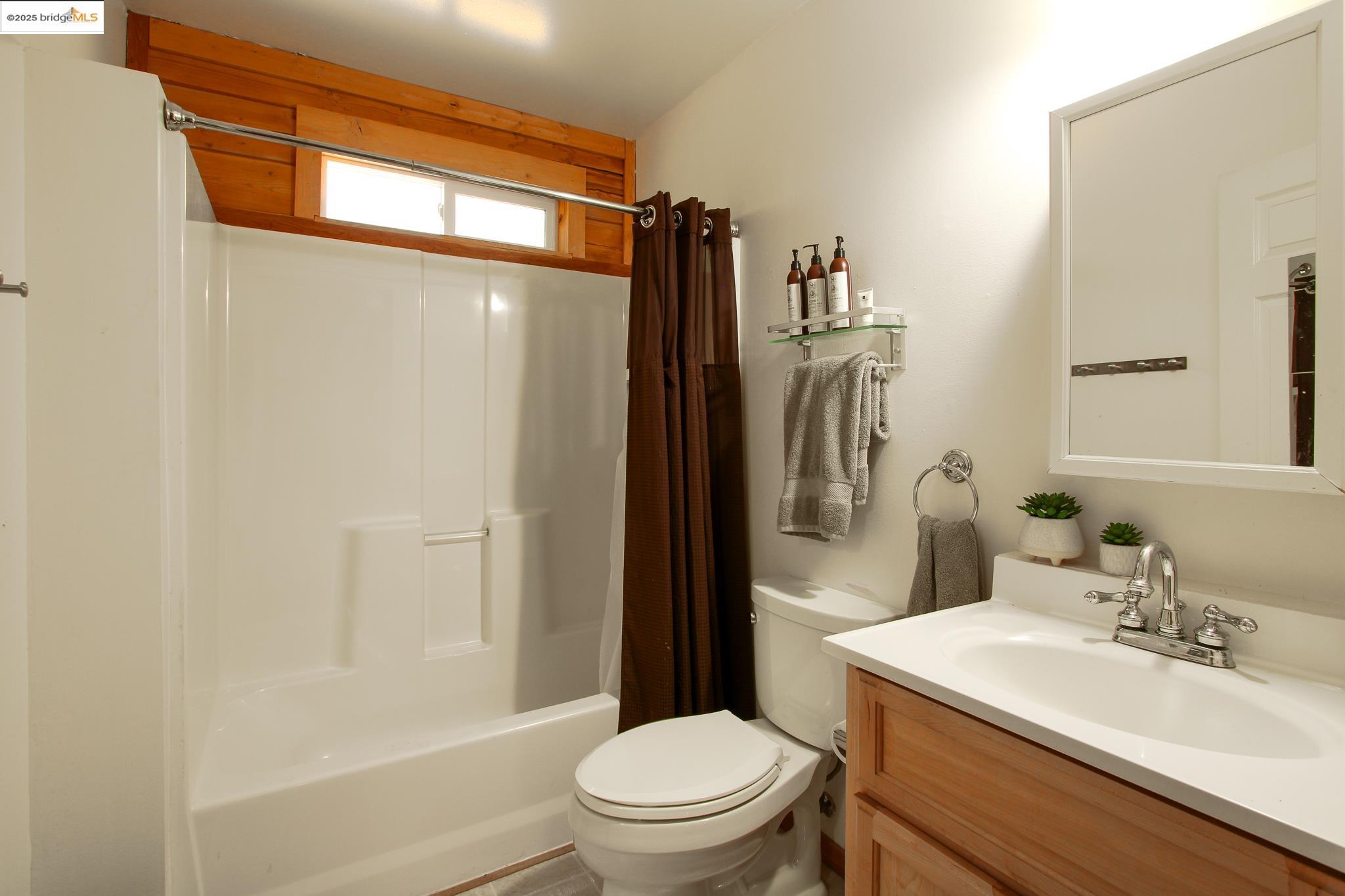 2936 Highway 4 Murphys, CA 95247 - Photo 31 of 41 a bathroom with a sink a toilet and shower