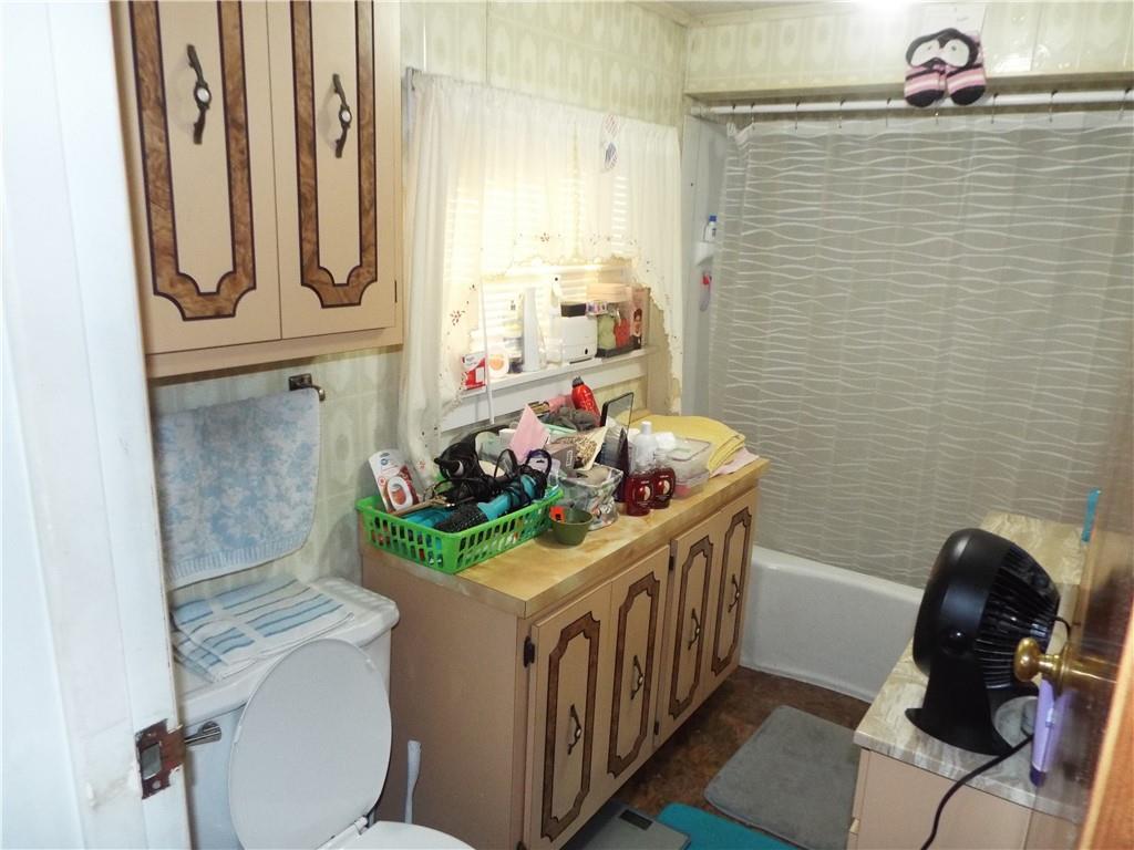 2524 2nd Street Grindstone, PA 15442 - Photo 13 of 30 a bathroom with a sink toilet and shower