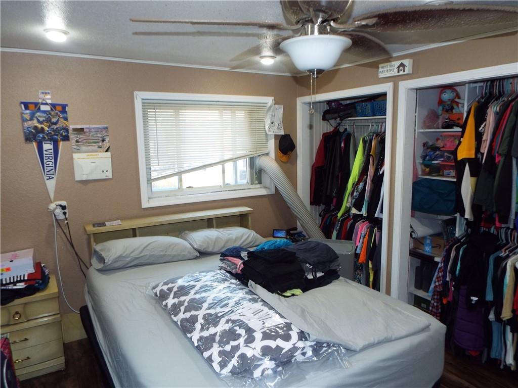 2524 2nd Street Grindstone, PA 15442 - Photo 18 of 30 a bedroom with a large bed and a window