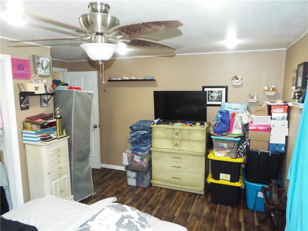 2524 2nd Street Grindstone, PA 15442 - Photo 20 of 30 a bedroom with a bed and flat screen tv