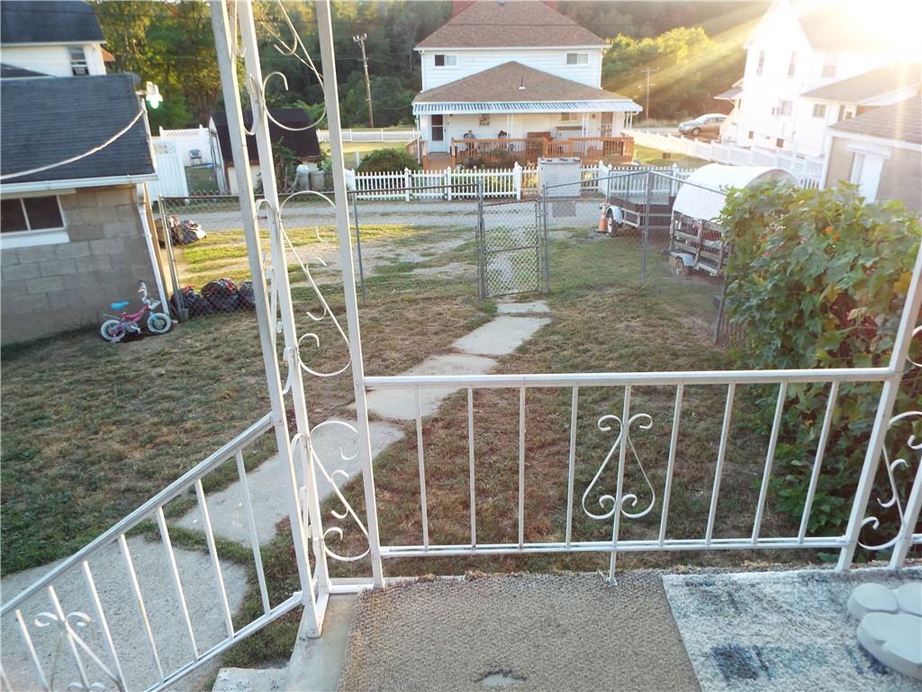 2524 2nd Street Grindstone, PA 15442 - Photo 29 of 30 a balcony with table and chairs