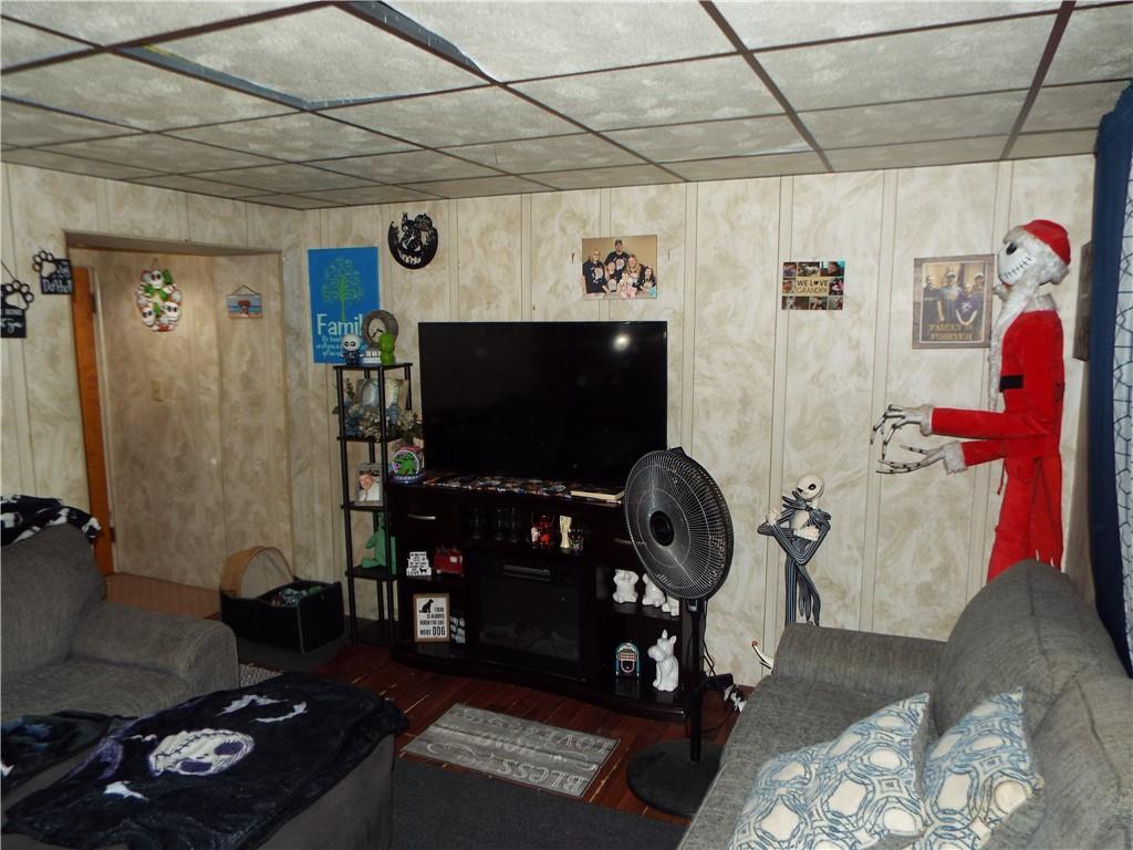 2524 2nd Street Grindstone, PA 15442 - Photo 4 of 30 a room with furniture and a flat screen tv