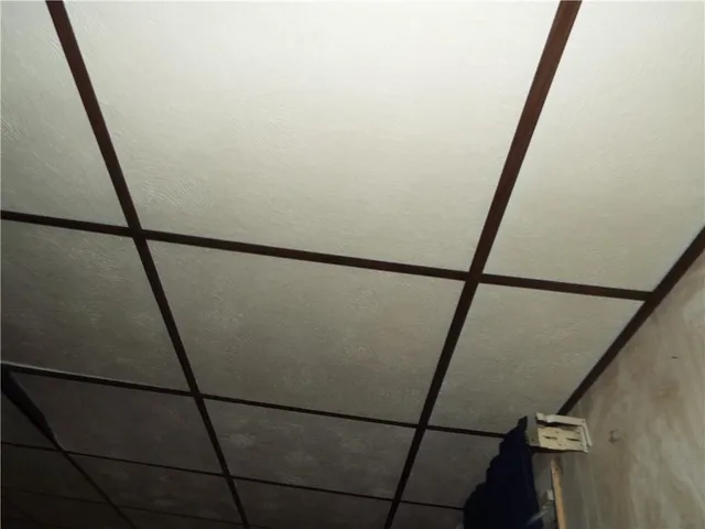 a kitchen with a sink a stove and a refrigerator