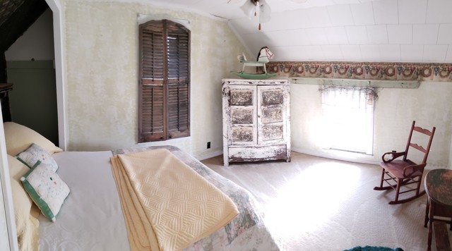 12721 Coleta Road Sterling, IL 61081 - Photo 17 of 35 a spacious bedroom with a bed and a window