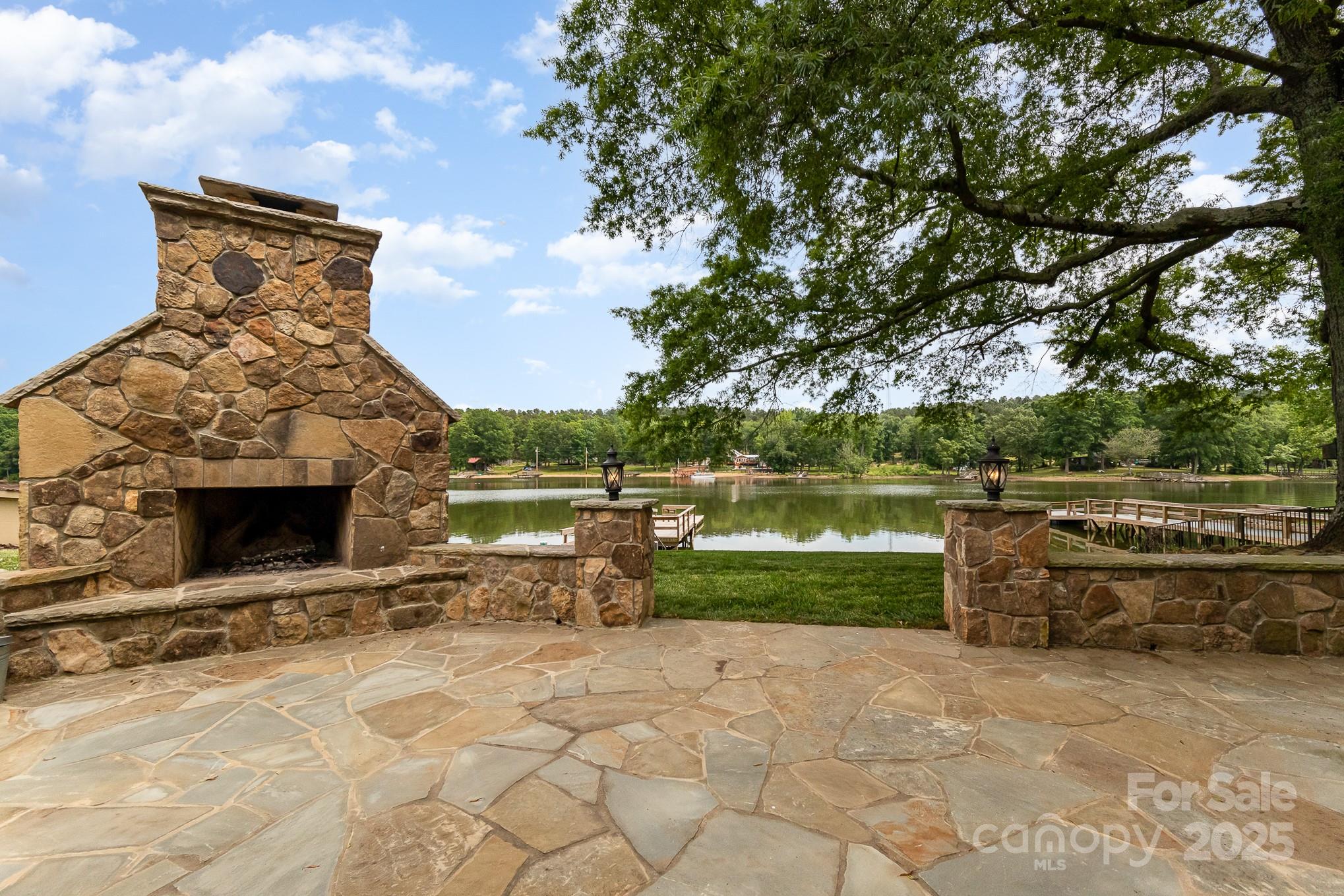 1435 Panther Point Road Richfield, NC 28137 - Photo 2 of 31 a view of a terrace with a backyard