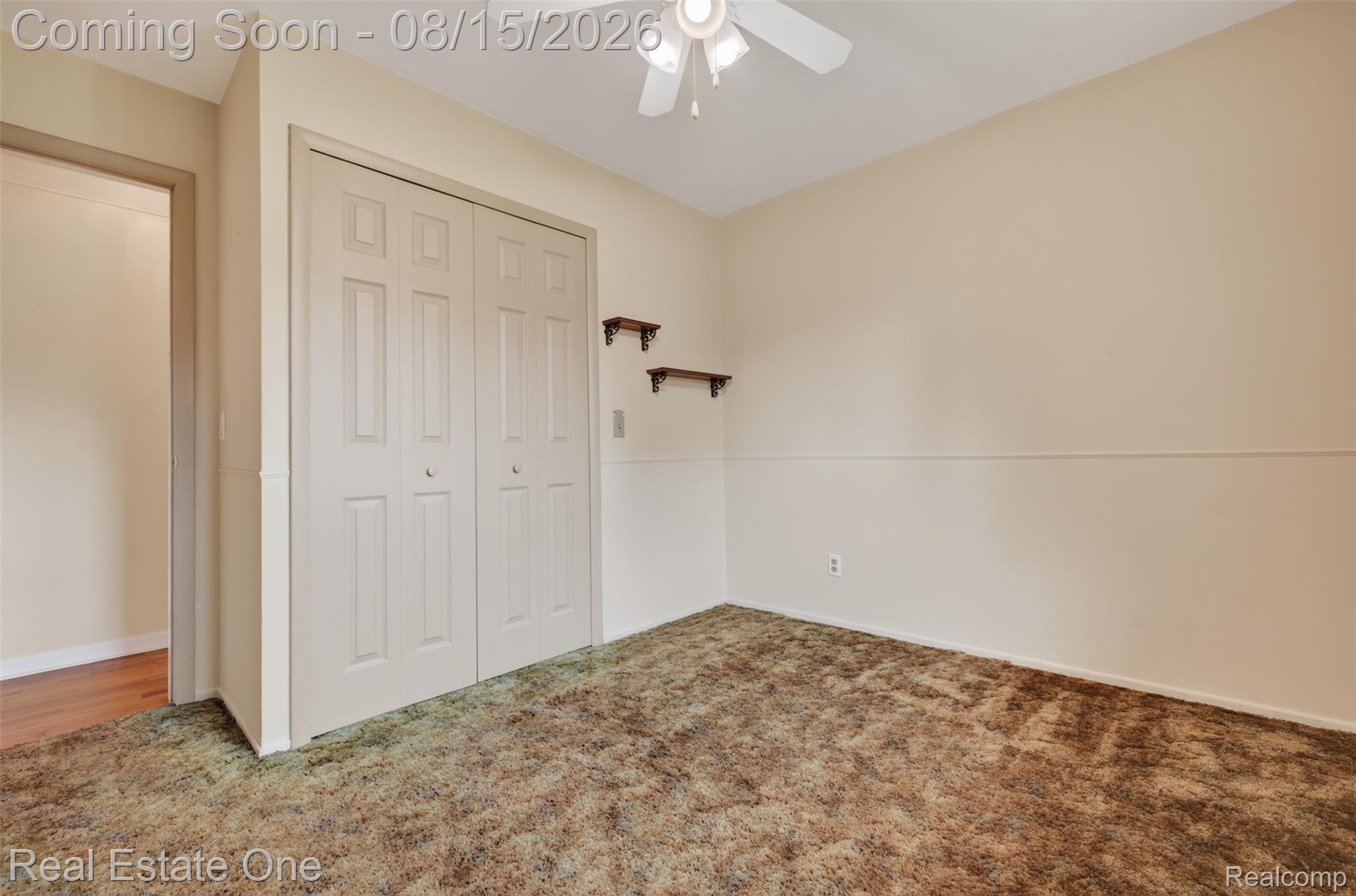 454 South Baldwin Road Oxford, MI 48371 - Photo 21 of 64 Neutral wall paint, ceiling fan, and carpeted flooring