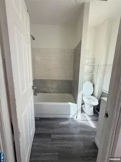 a bathroom with a sink and a bathtub