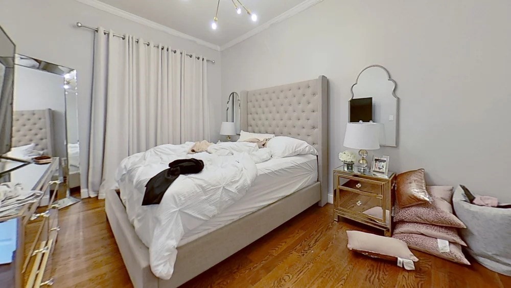 2973 Washington Street, Unit A Boston, MA 02119 - Photo 5 of 6 a bedroom with bed and a window