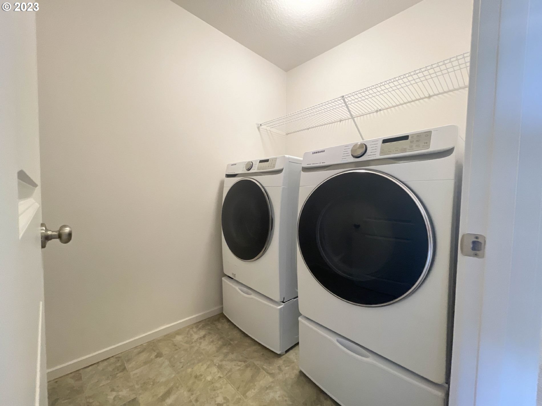 2211 Southeast 19th Street Gresham, OR 97080 - Photo 14 of 16 a utility room with dryer and washer