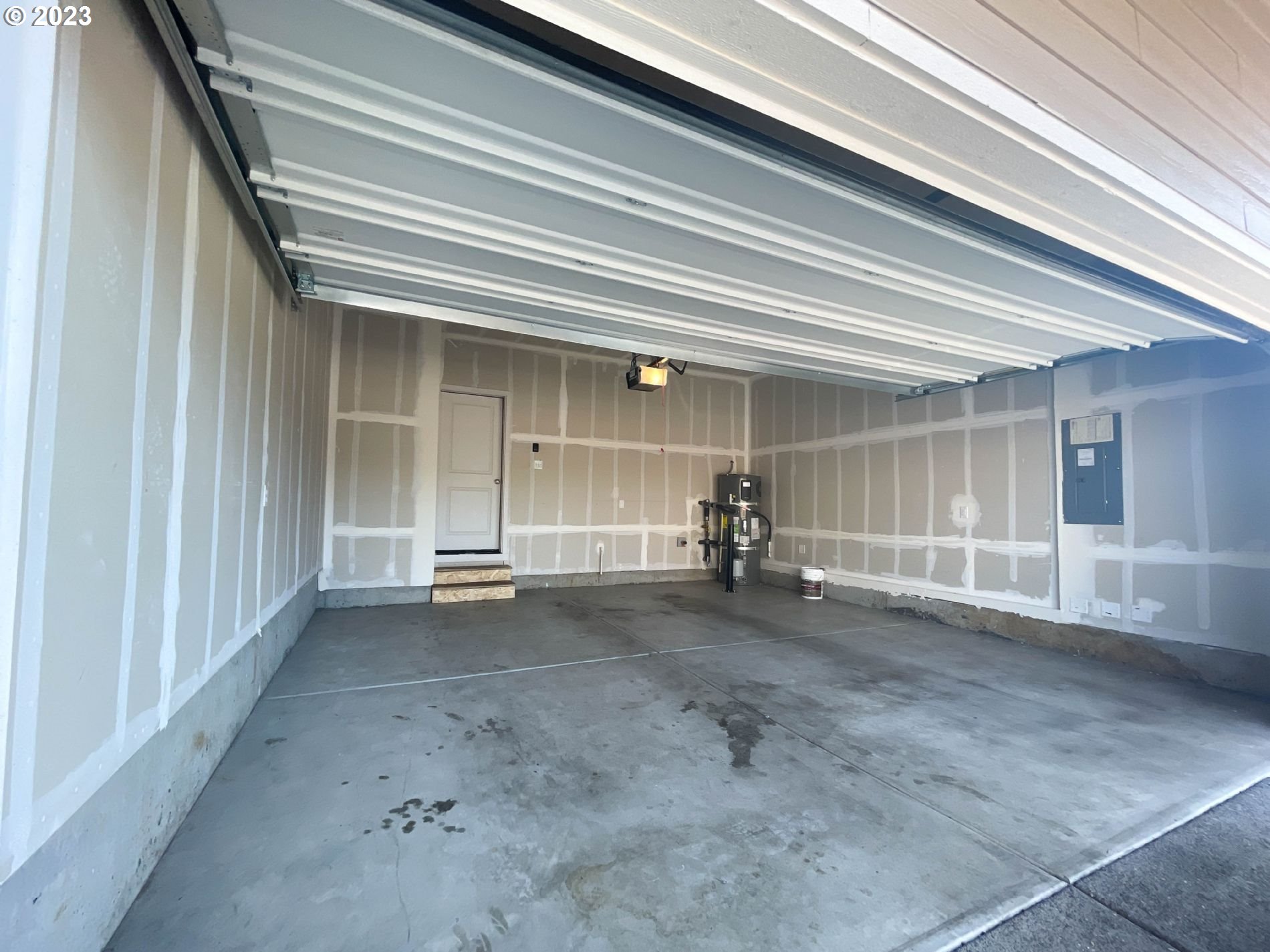2211 Southeast 19th Street Gresham, OR 97080 - Photo 15 of 16 a view of empty room with wooden floor and fan