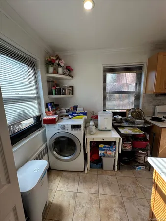 a view of kitchen and sink