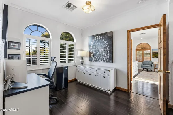 a living room with furniture pool table and flat screen tv