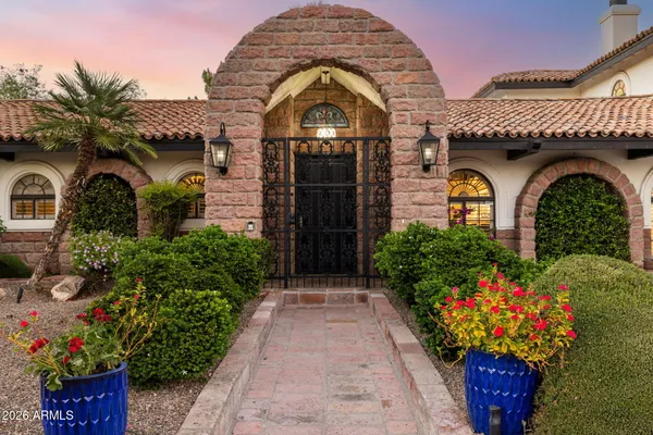 a view of living room filled with furniture and a table