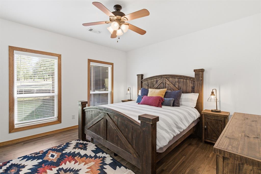 160 Falcon Drive Weatherford, TX 76088 - Photo 16 of 40 a bedroom with a bed and a window