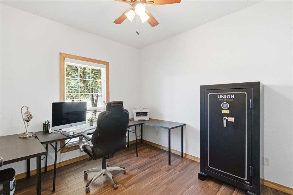 160 Falcon Drive Weatherford, TX 76088 - Photo 25 of 40 a view of a workspace with furniture and a window