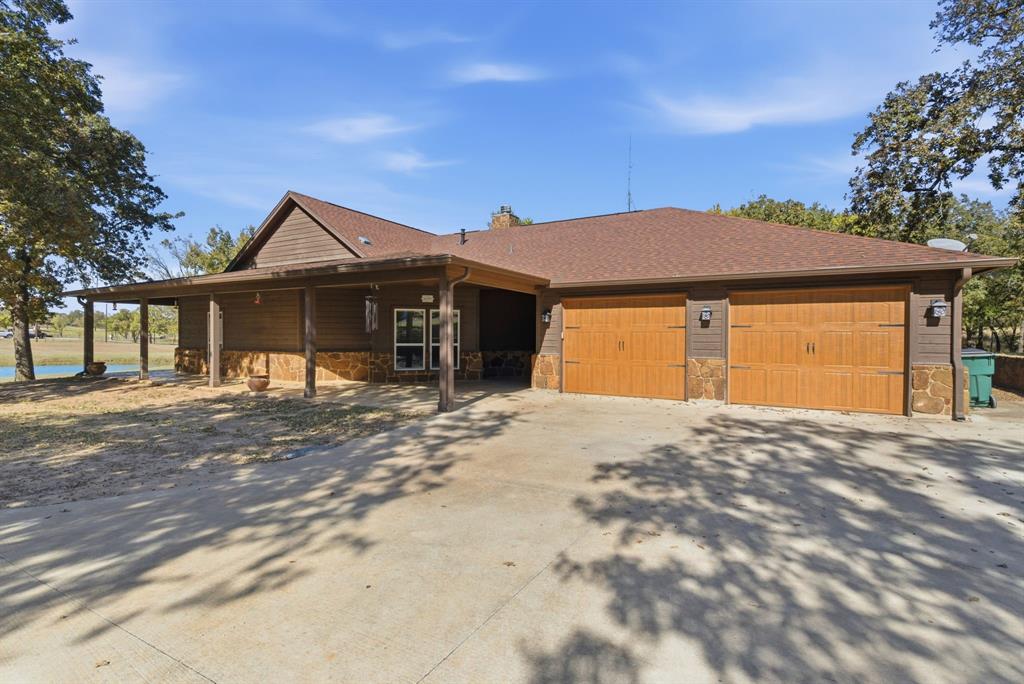 160 Falcon Drive Weatherford, TX 76088 - Photo 32 of 40 a front view of a house with a yard