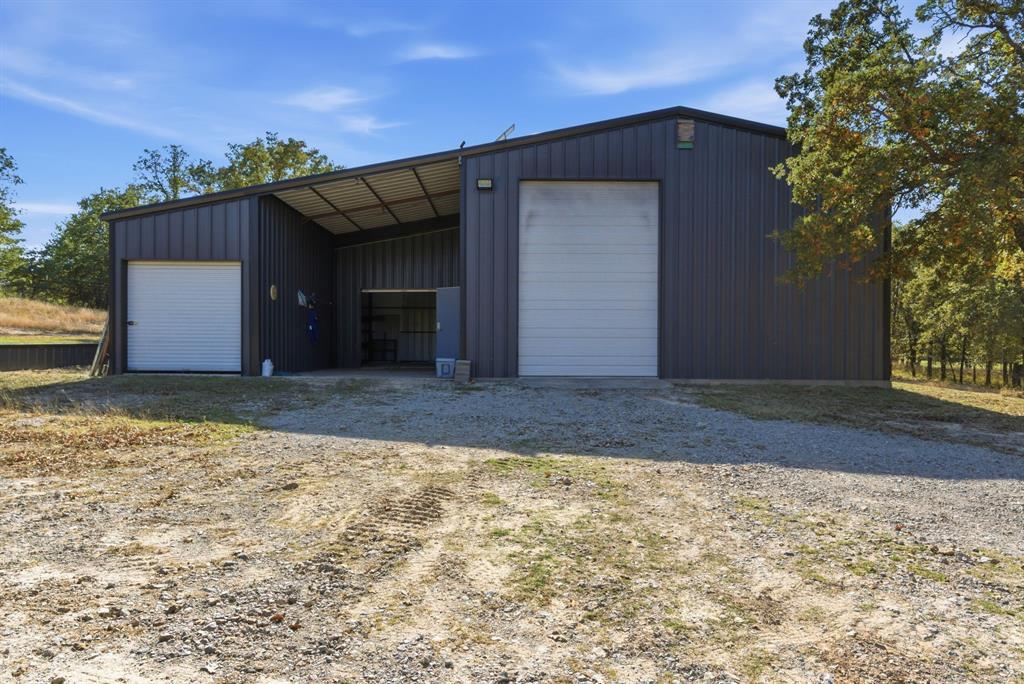 160 Falcon Drive Weatherford, TX 76088 - Photo 34 of 40 a view of a house with a garage