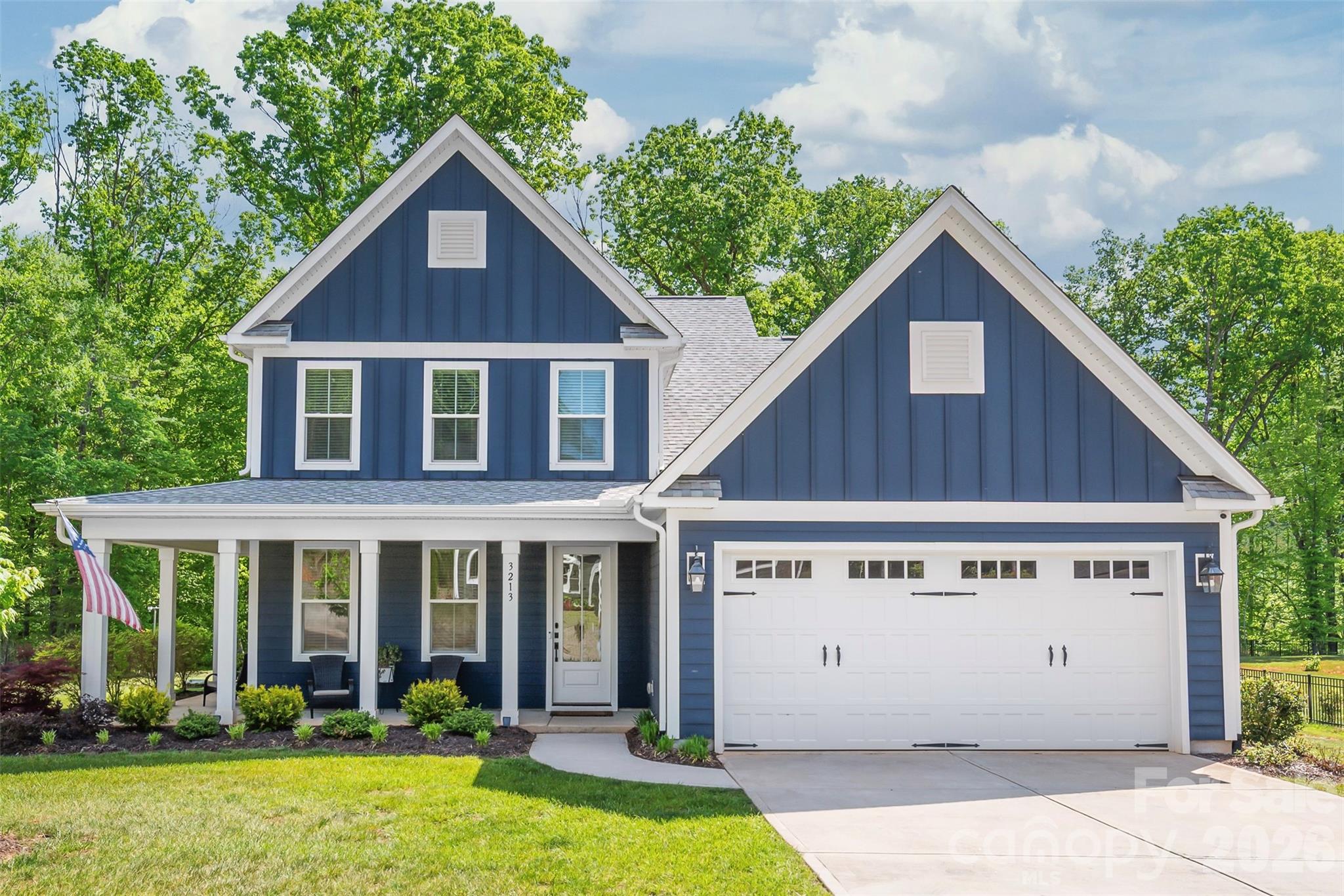 3213 Timber Run Lane Maiden, NC 28650 - Photo 2 of 47 a view of a house with yard and plants
