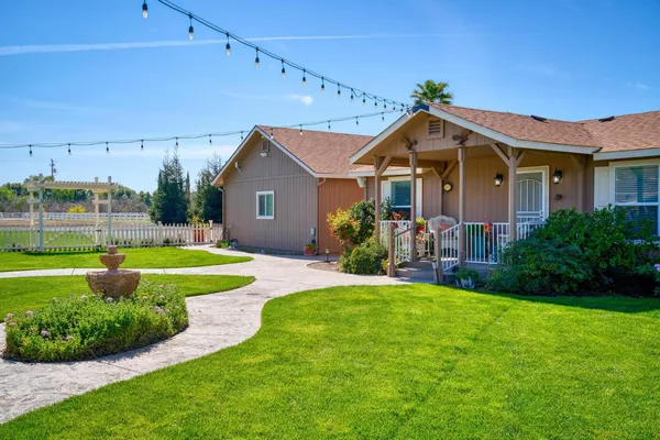 a bedroom with a bed and a mirror