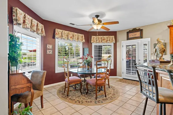 a view of a park with iron fence