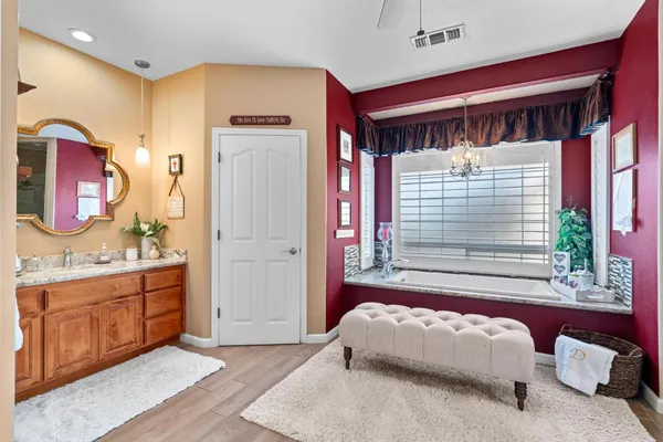 a view of storage and utility room with refrigerator