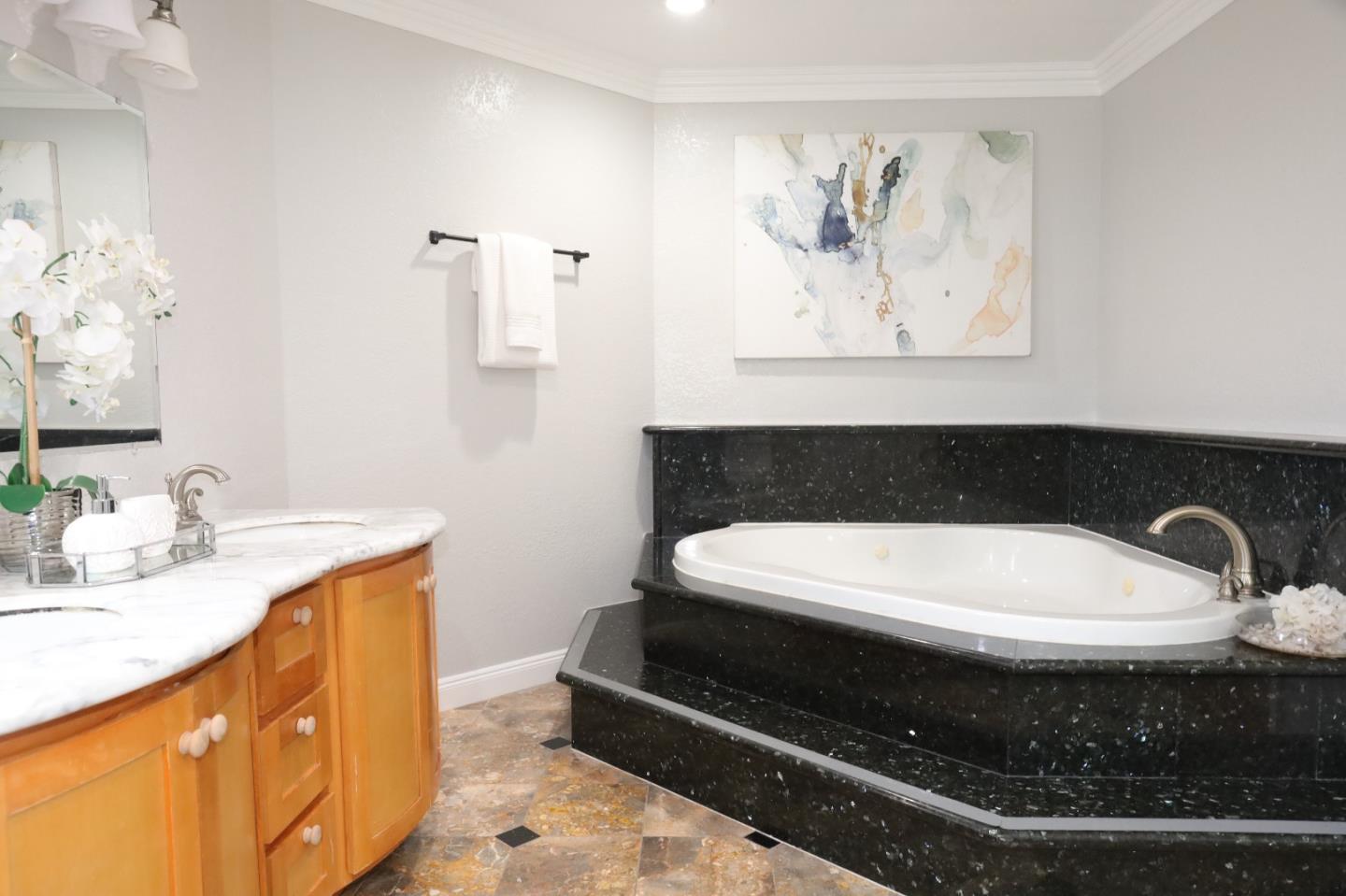 5450 Monterey Road, Unit 168 San Jose, CA 95111 - Photo 13 of 65 a bathroom with a sink and a mirror