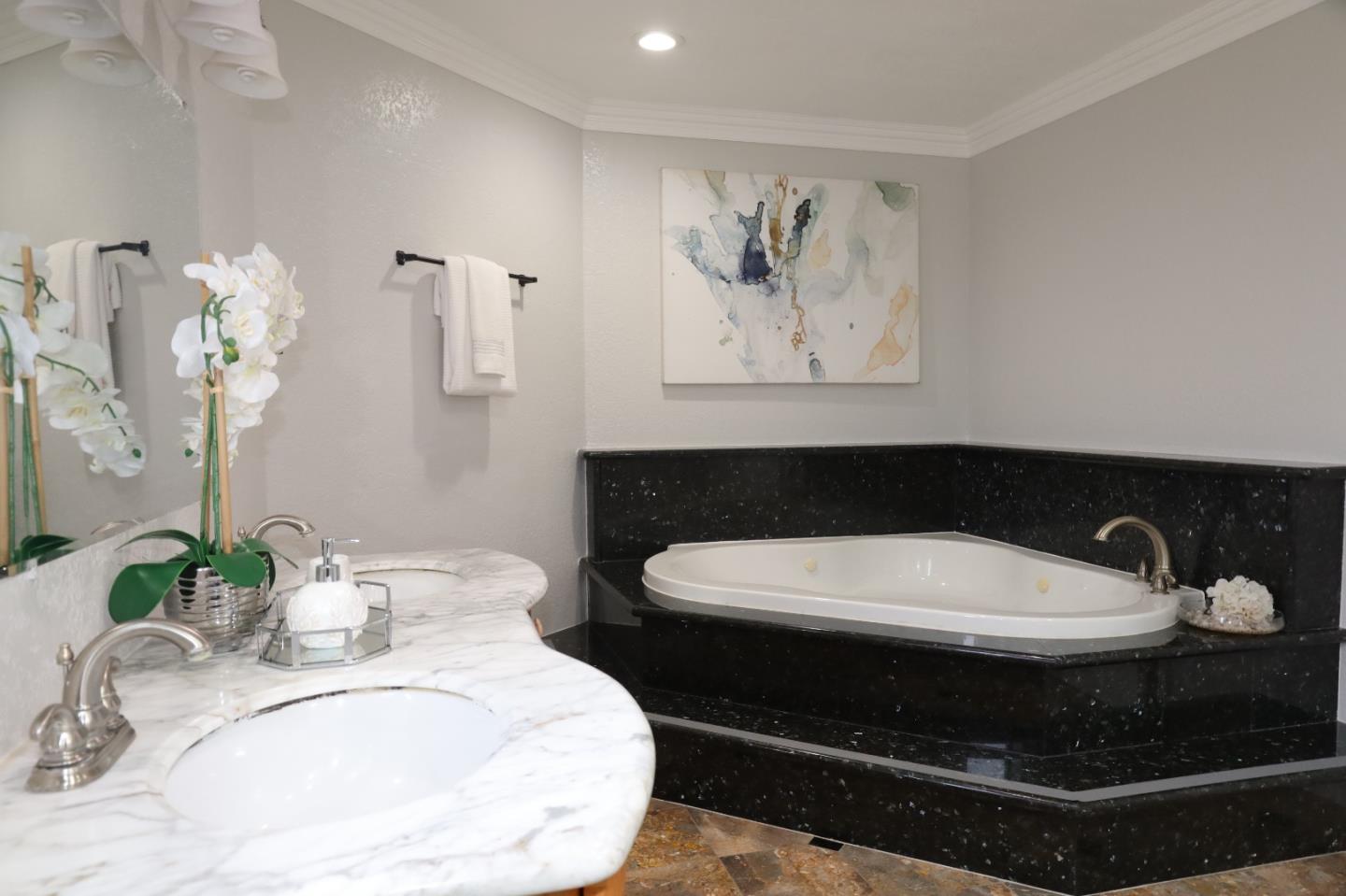 5450 Monterey Road, Unit 168 San Jose, CA 95111 - Photo 19 of 65 a bathroom with a sink and a mirror