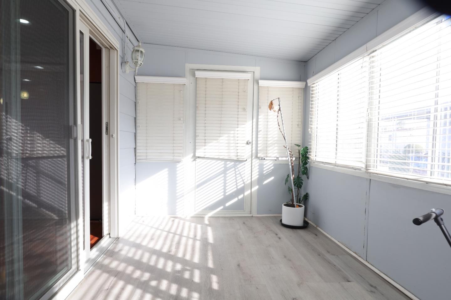 5450 Monterey Road, Unit 168 San Jose, CA 95111 - Photo 21 of 65 a view of empty room with wooden floor and fan