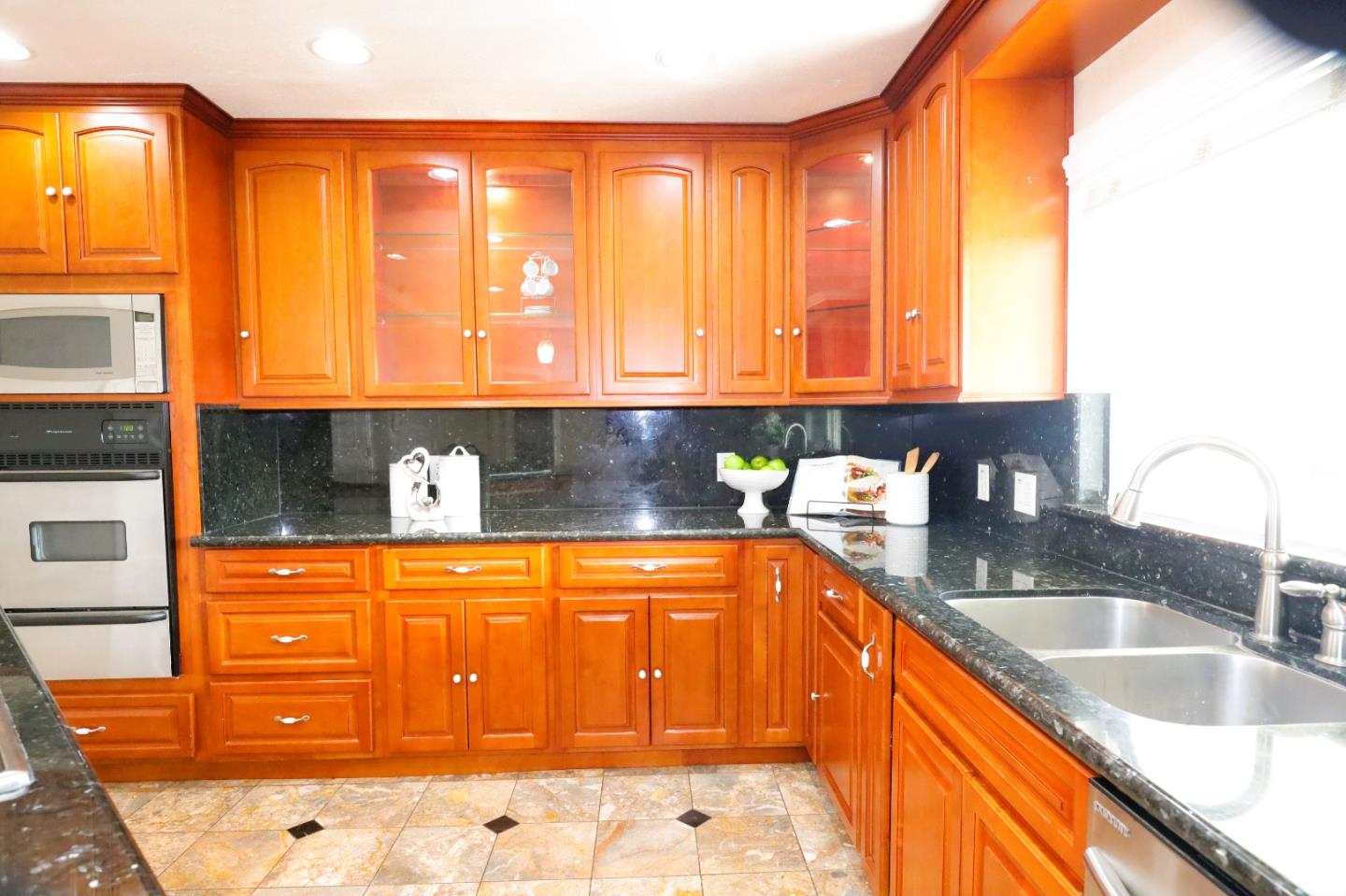 5450 Monterey Road, Unit 168 San Jose, CA 95111 - Photo 26 of 65 a kitchen with granite countertop a sink and a stove