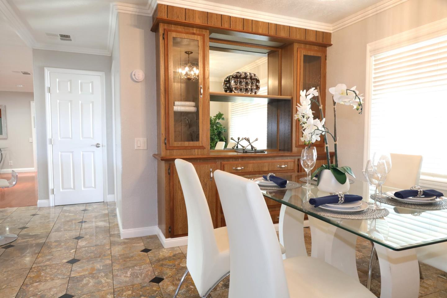 5450 Monterey Road, Unit 168 San Jose, CA 95111 - Photo 42 of 65 a view of a kitchen area with granite countertop a sink and a refrigerator