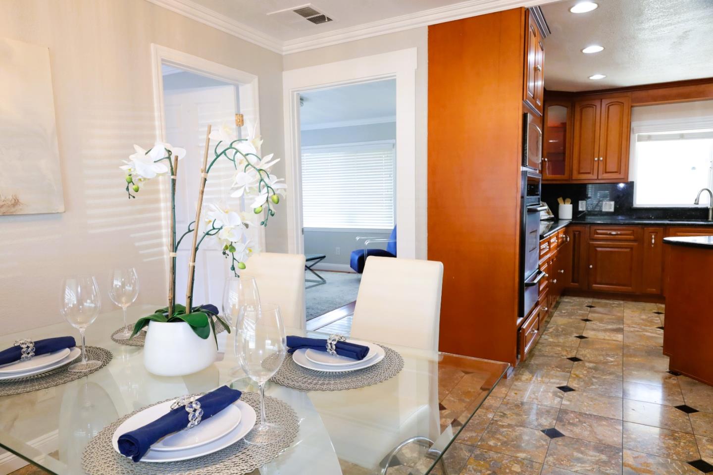 5450 Monterey Road, Unit 168 San Jose, CA 95111 - Photo 44 of 65 a kitchen with stainless steel appliances granite countertop a sink and a stove