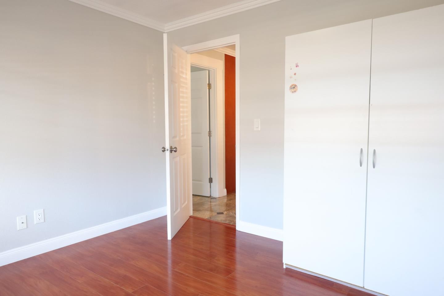 5450 Monterey Road, Unit 168 San Jose, CA 95111 - Photo 47 of 65 an empty room with wooden floor