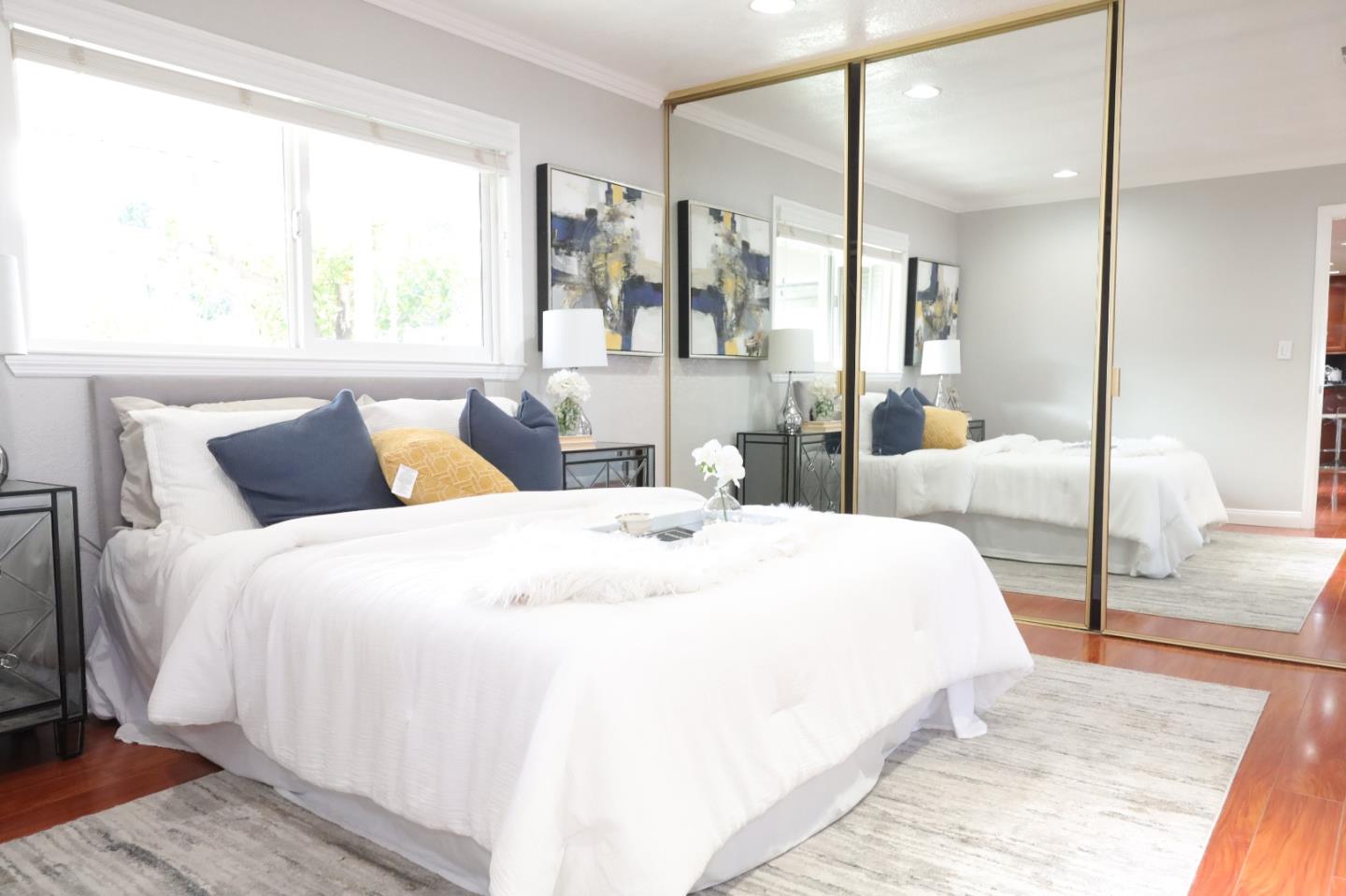 5450 Monterey Road, Unit 168 San Jose, CA 95111 - Photo 5 of 65 a bedroom with a large bed and a large window