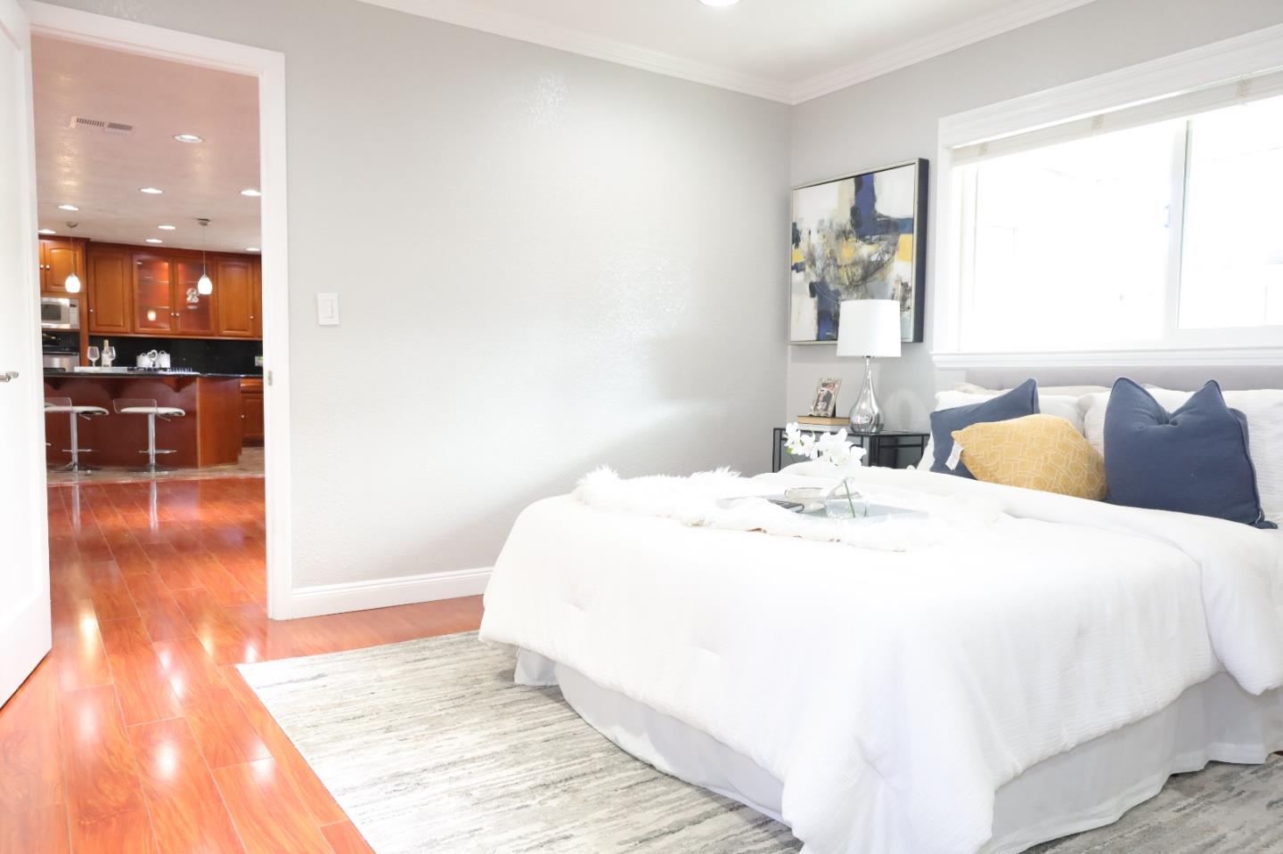 5450 Monterey Road, Unit 168 San Jose, CA 95111 - Photo 7 of 65 a spacious bedroom with a bed and a large window