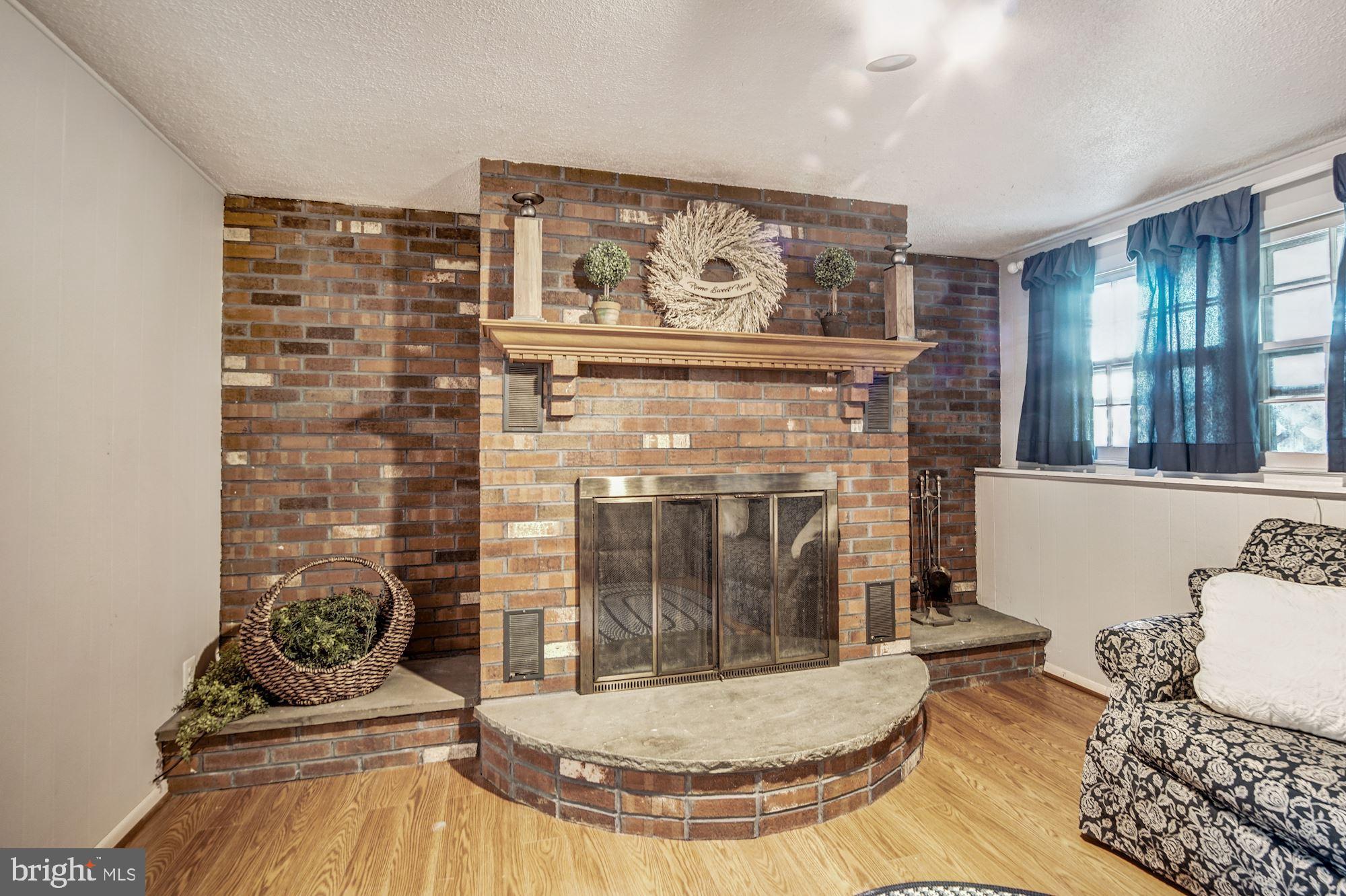 906 Linfield Road Newark, DE 19713 - Photo 20 of 28 Brick wood burning fireplace