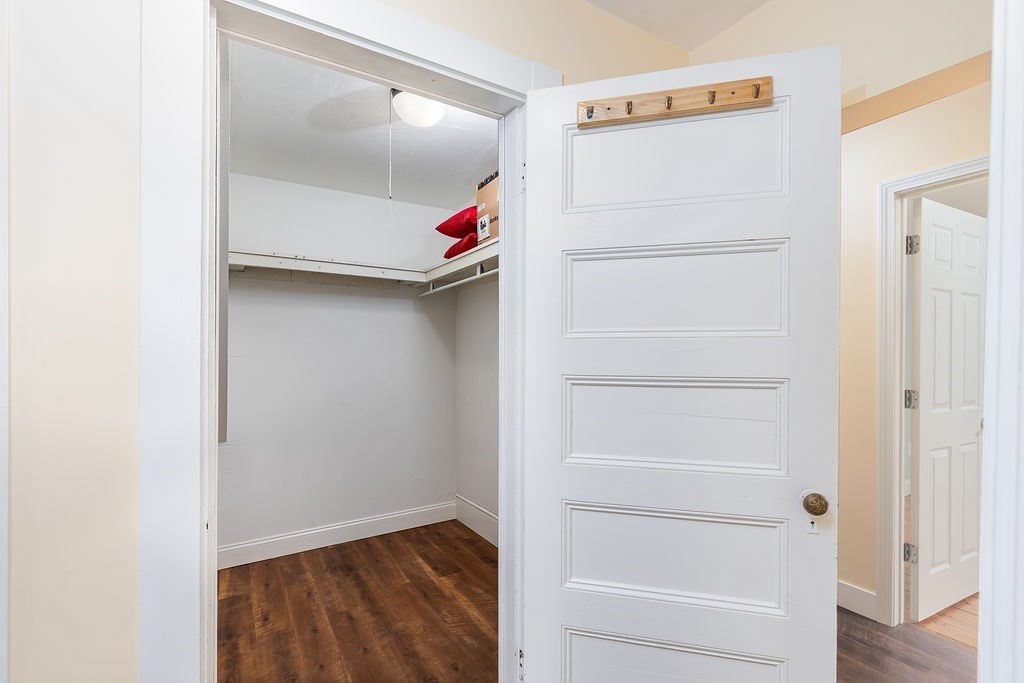 363 Concord Road Billerica, MA 01821 - Photo 18 of 42 a view of walk in closet with empty racks
