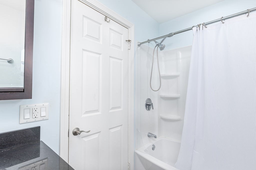 363 Concord Road Billerica, MA 01821 - Photo 19 of 42 a bathroom with a shower and a shower