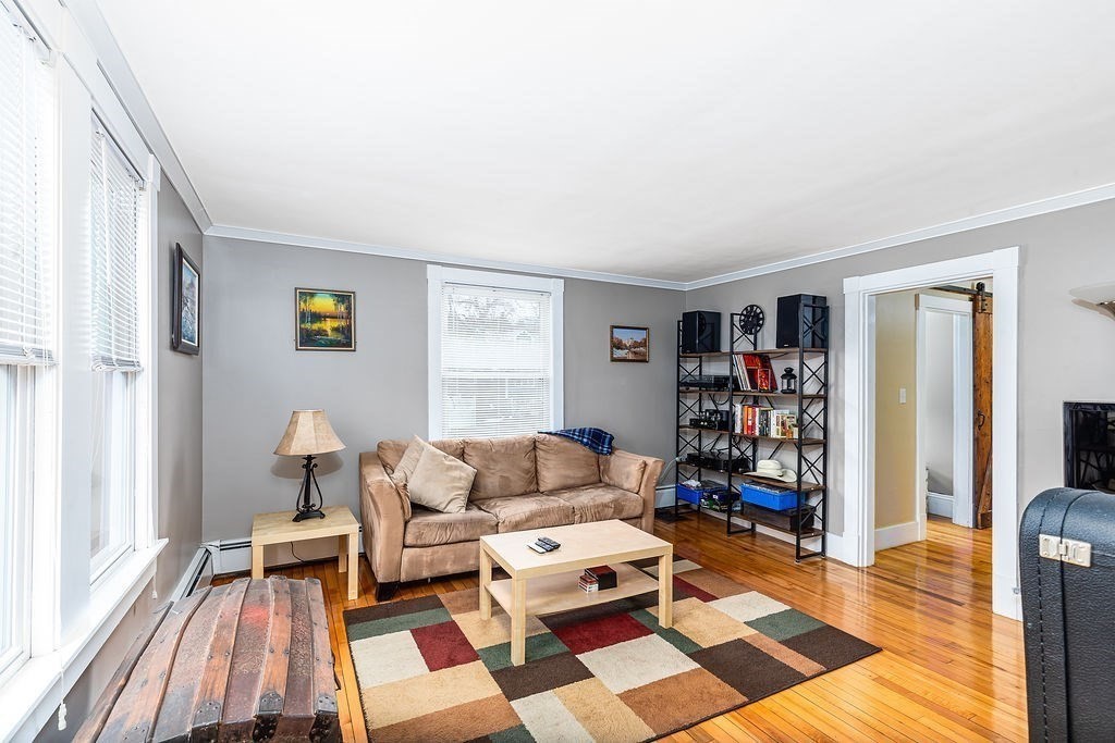 363 Concord Road Billerica, MA 01821 - Photo 22 of 42 a living room with furniture and a rug