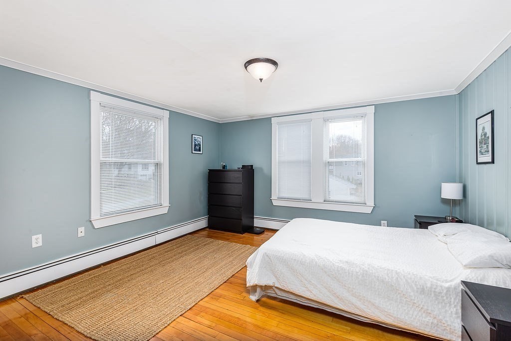 363 Concord Road Billerica, MA 01821 - Photo 25 of 42 a bedroom with a bed dresser and a window