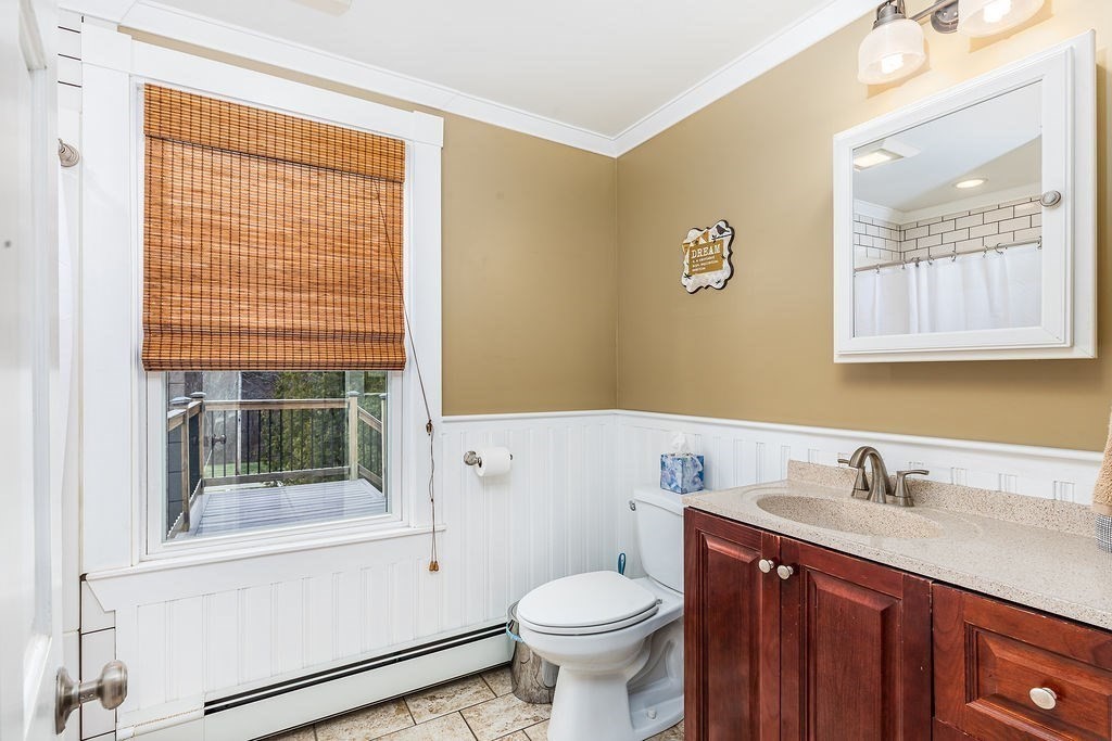 363 Concord Road Billerica, MA 01821 - Photo 29 of 42 a bathroom with a sink a toilet and shower