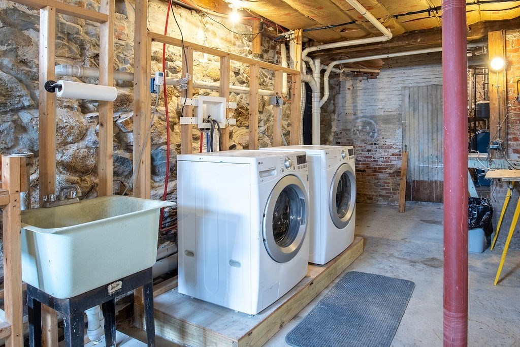 363 Concord Road Billerica, MA 01821 - Photo 34 of 42 a utility room with dryer and washer