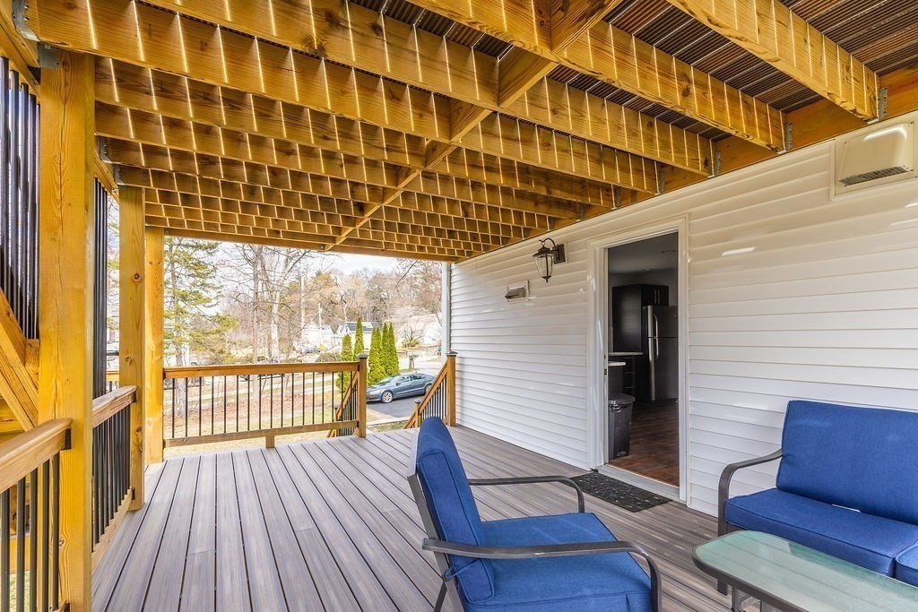 363 Concord Road Billerica, MA 01821 - Photo 39 of 42 a view of a balcony with wooden floor