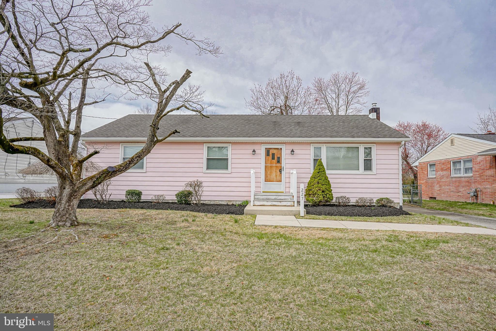 227 Harmony Road Gibbstown, NJ 08027 - Photo 2 of 29 a view of a house with a yard
