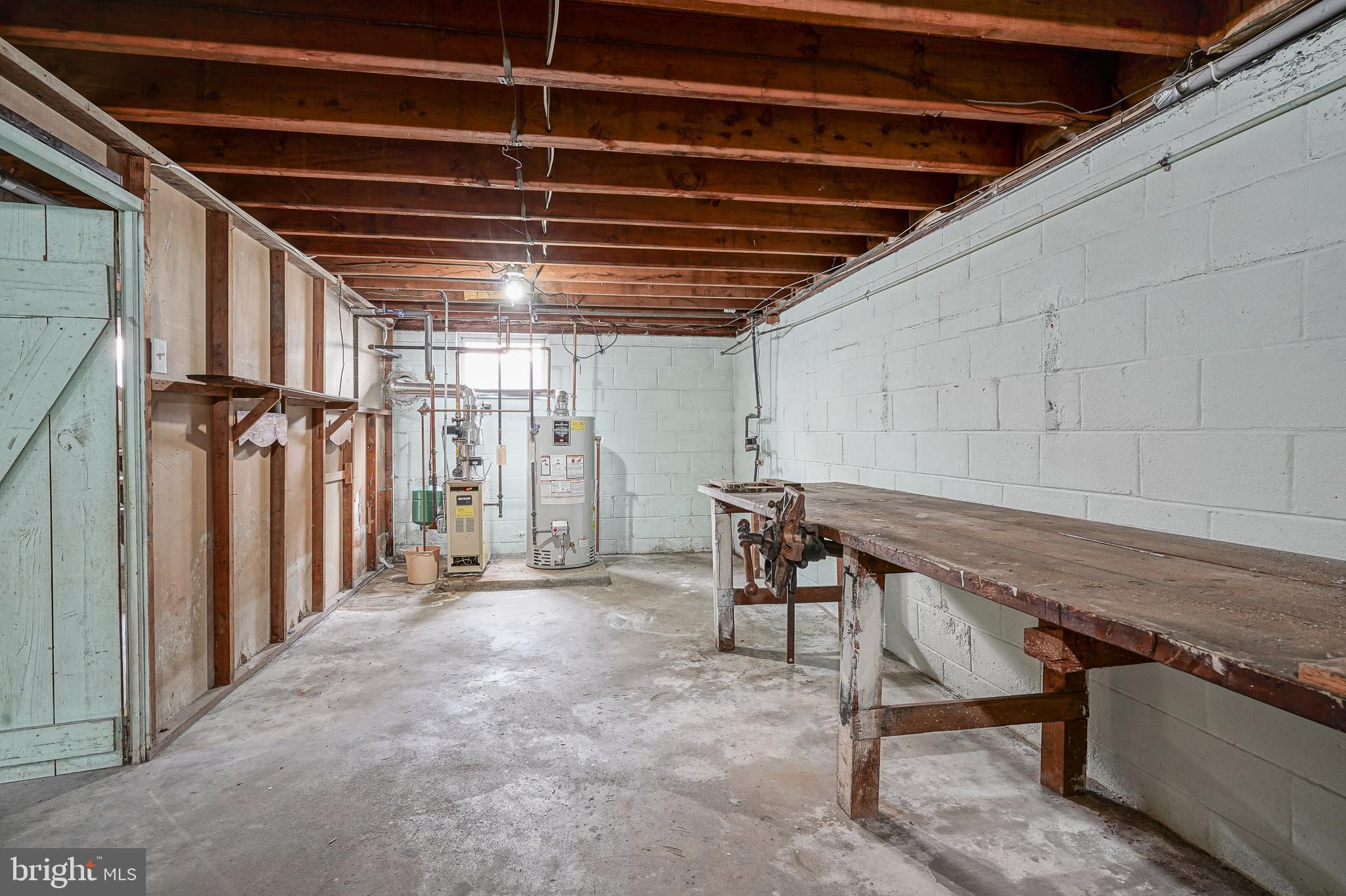 227 Harmony Road Gibbstown, NJ 08027 - Photo 27 of 29 a view of an empty room with a couch