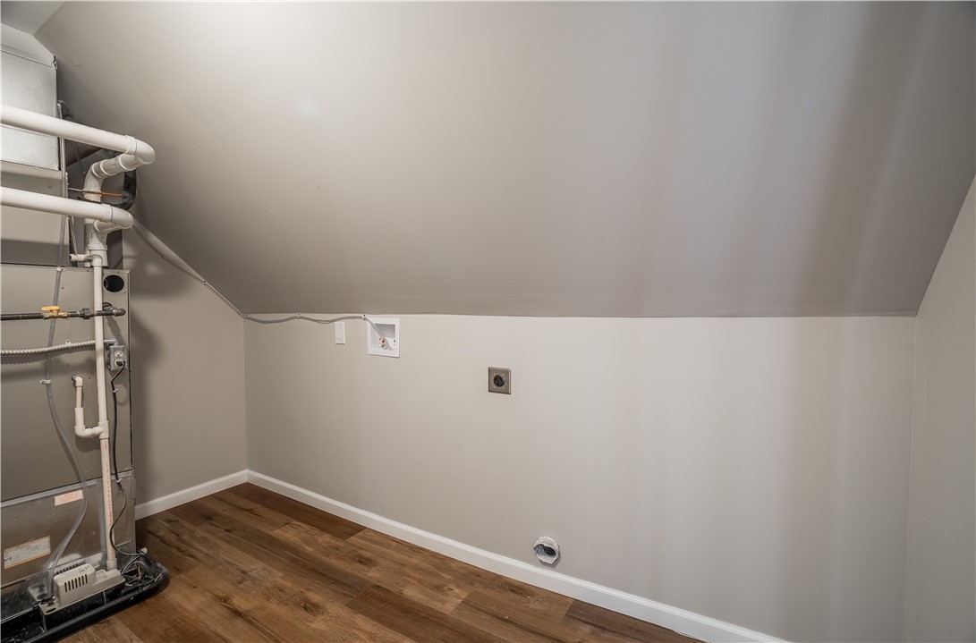 8240 Looney Road Piqua, OH 45356 - Photo 24 of 49 This dedicated utility space offers convenient laundry hookups and essential mechanical systems.