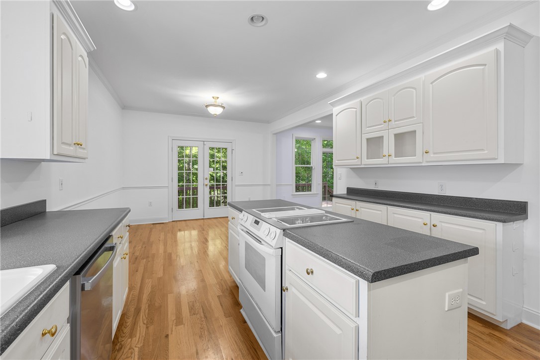 110 Brookstone Way Central, SC 29630 - Photo 10 of 46 Bright and open kitchen with ample counter space and French doors leading to outdoor areas.