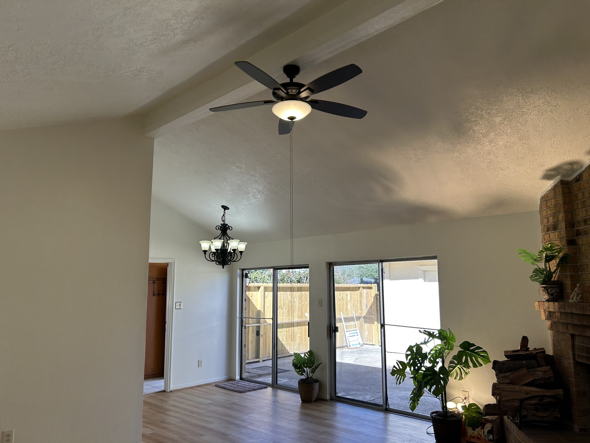 25414 Cottage Hill Lane Spring, TX 77373 - Photo 12 of 50 a view of a livingroom with a potted plant a ceiling fan and a window