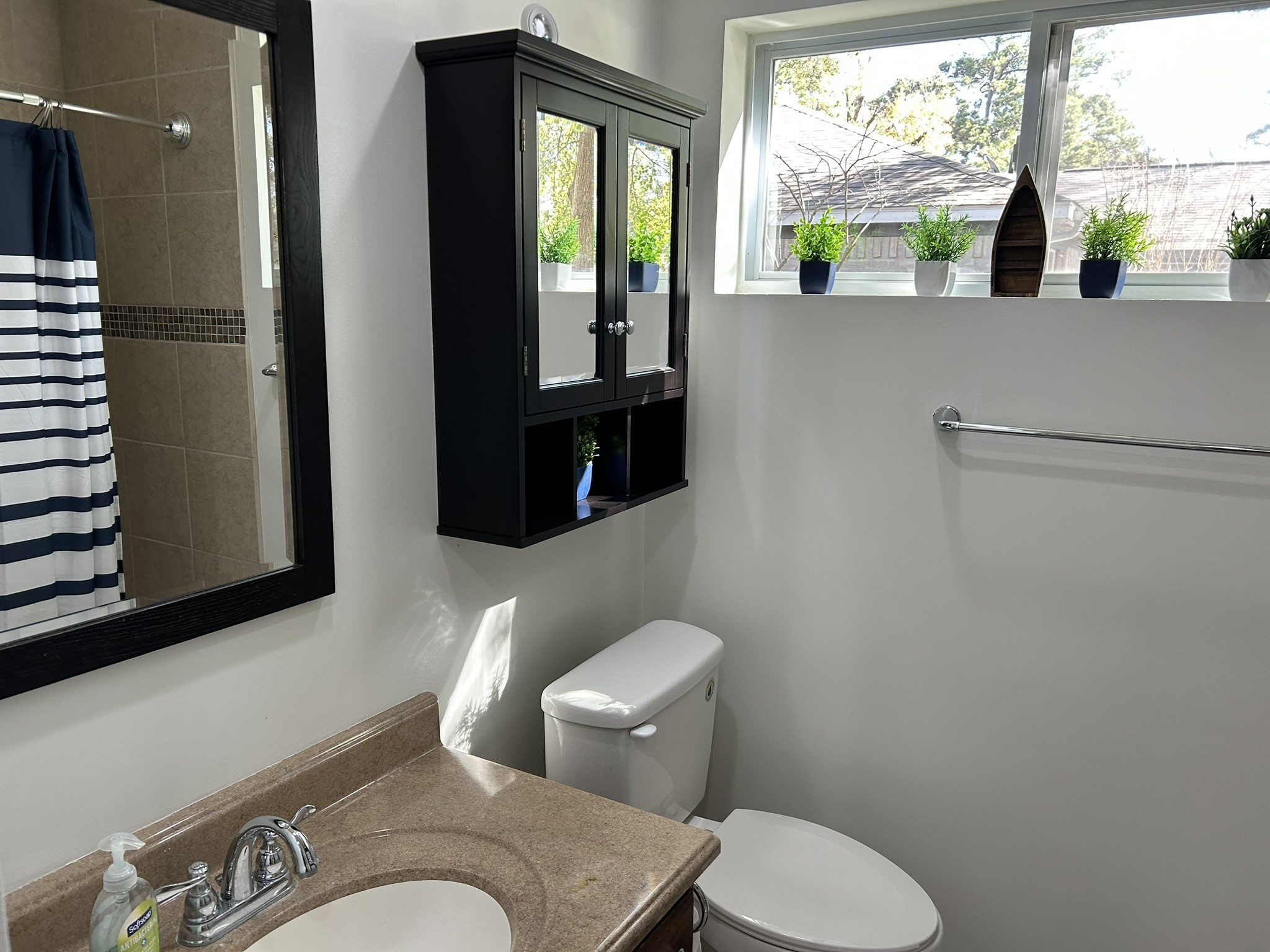 25414 Cottage Hill Lane Spring, TX 77373 - Photo 26 of 50 a bathroom with a toilet sink and mirror