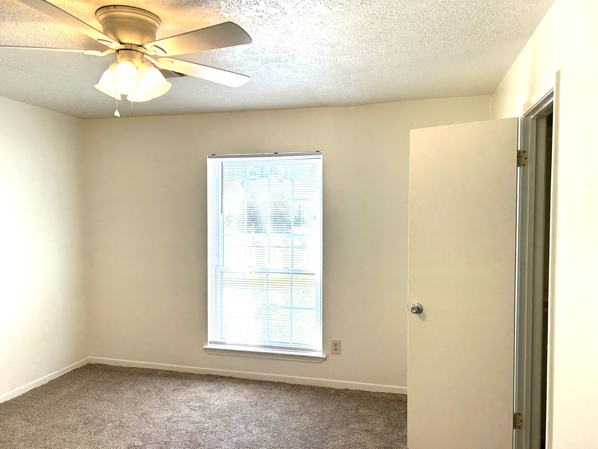 25414 Cottage Hill Lane Spring, TX 77373 - Photo 30 of 50 an empty room with a window and a fan